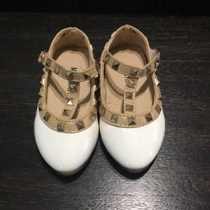 White make believe designer shoes lol